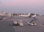 Manas International Airport, Bishkek, Kyrgyzstan at dawn.